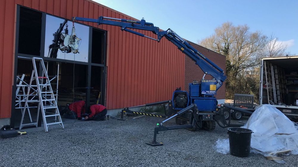 Pose de vitrage en hauteur à la grue ventouse